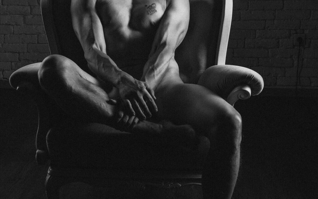 Nude Male Sitting on a Chair